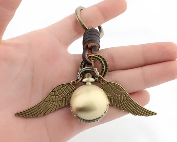 Brelok zegarek Harry Czarownik Snitch miniaturowy zegarek w formie Złotego Znicza dla fanów serii - obrazek 2